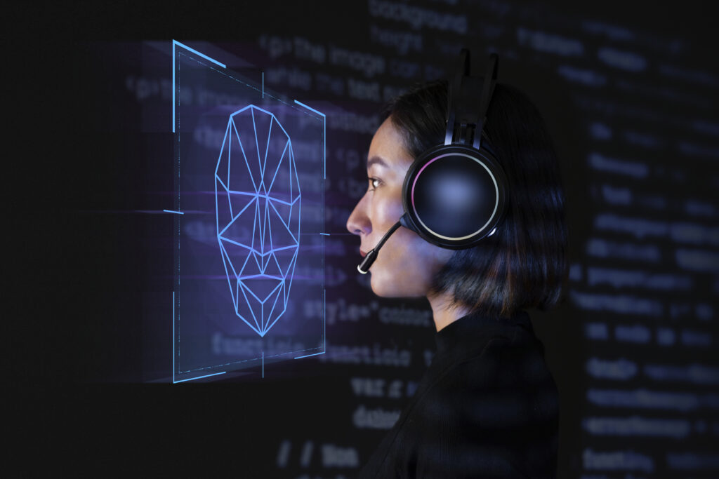 female programmer scanning her face with biometric security tech